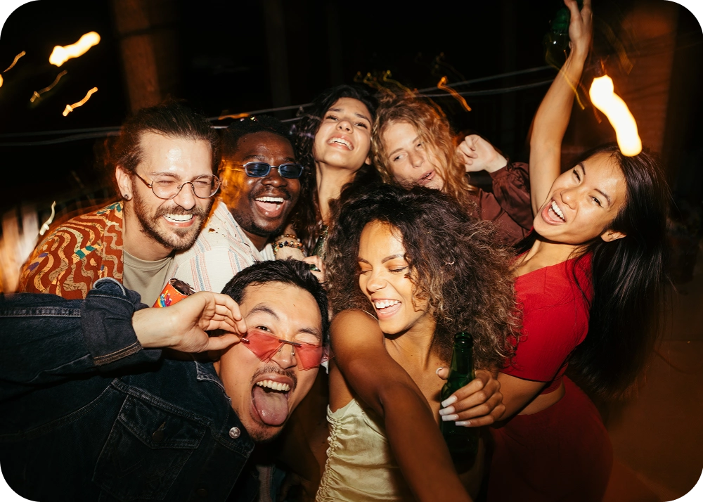 Group of friends partying and laughing